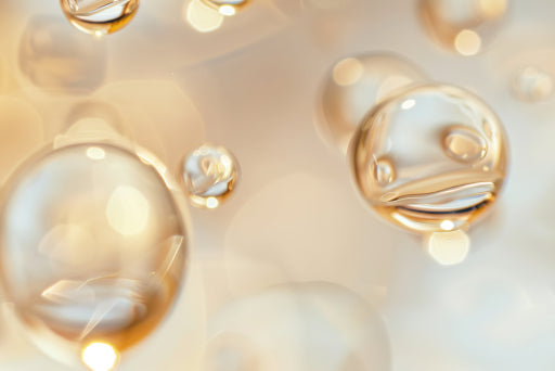 Golden skincare serum bubbles